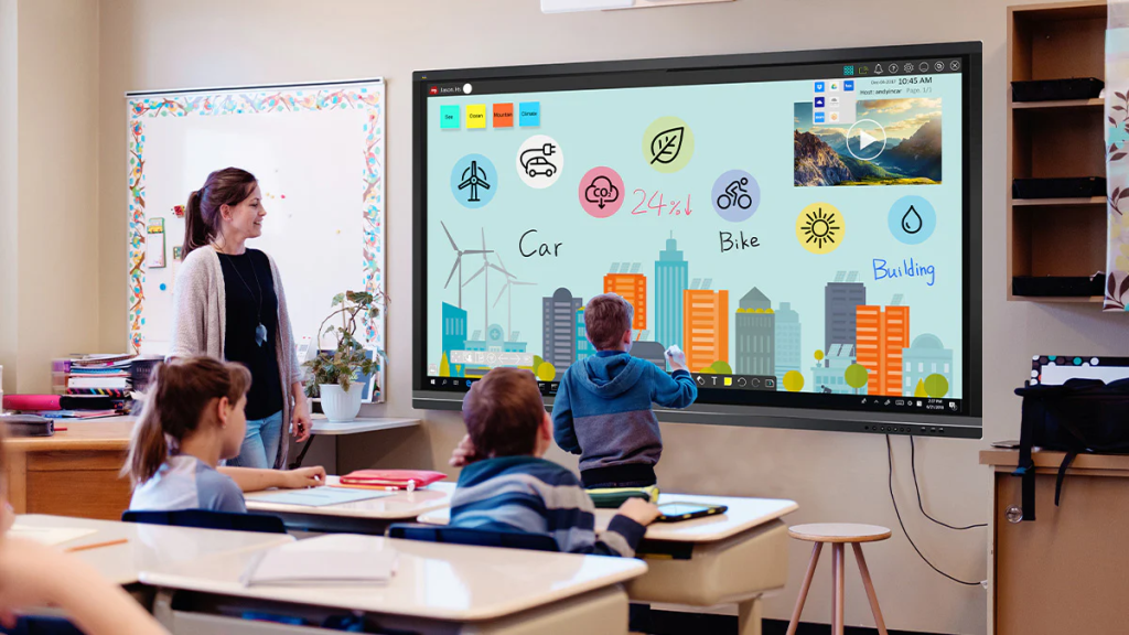 students and a teacher using a digital panel